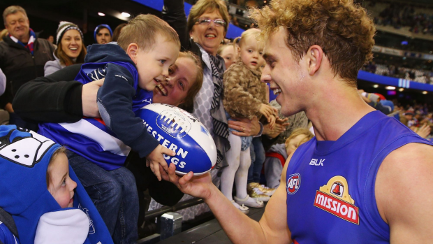 Article image for Dogs love their fast footy