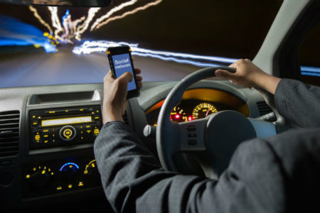 Queensland lifts fine for using phone behind the wheel