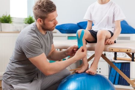 Physiotherapist Dr Andrew Thompson treats your aches and pains