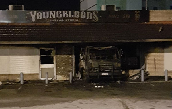 Article image for Truck crash at tattoo parlour causes fire