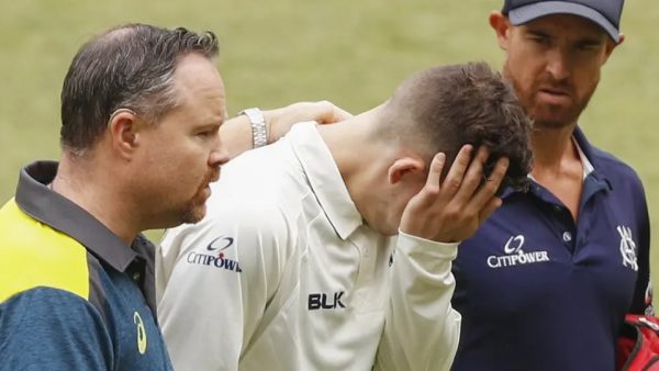 Nic Maddinson leaves the field with suspected broken arm