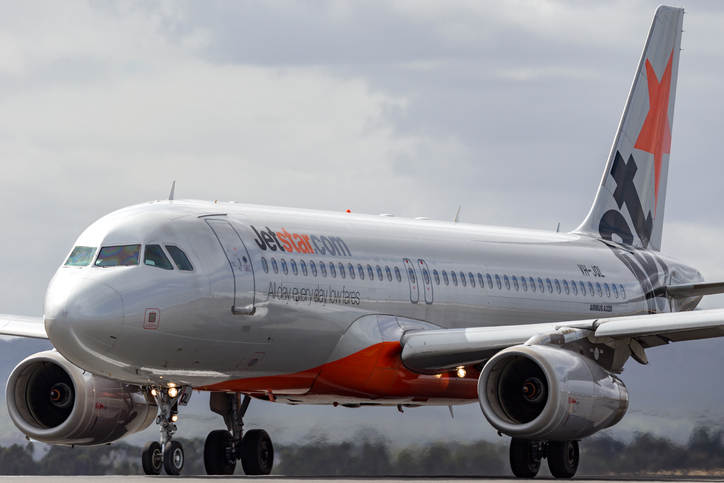 Article image for Perth-Bali flight halted after man starts drinking duty free booze on board
