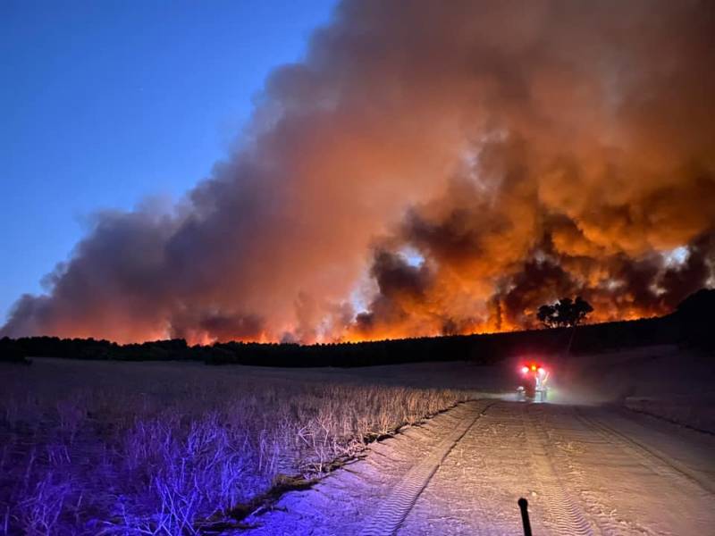 Article image for Firefighters brace for difficult conditions as fires rage across the state