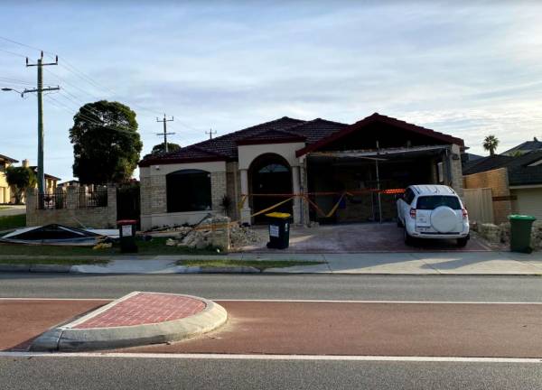 Article image for Car ploughs into northern suburbs home after two car crash