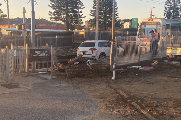 Article image for Crashed car abandoned on Fremantle train line causes ‘major delays’