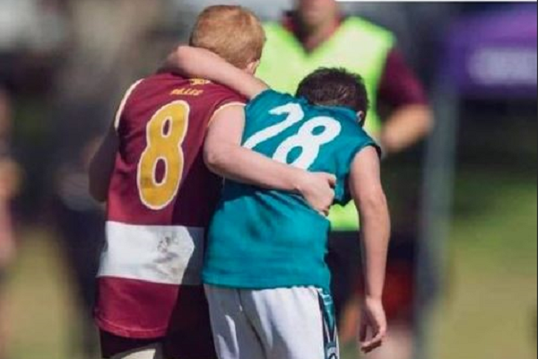 Article image for Heroic act of sportsmanship at junior footy grand final