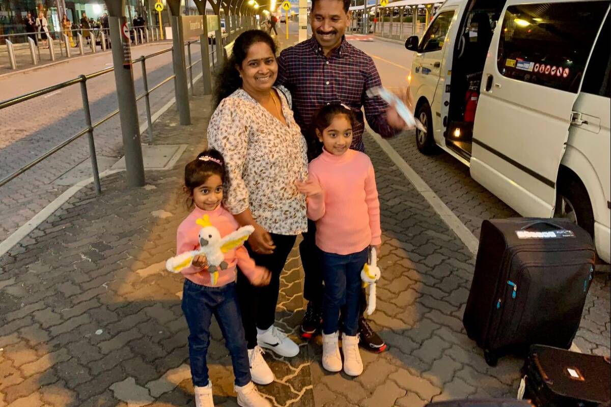 Article image for Long-exiled Murugappan family board plane home to Biloela