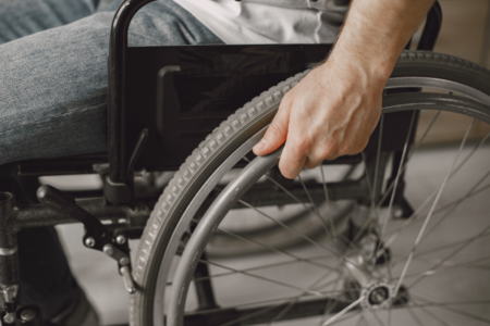 Eight year-old ‘forced to crawl’ due to NDIS wheelchair refusal