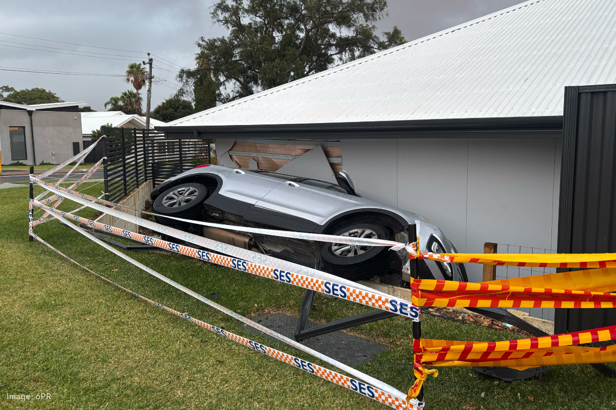 Article image for Incredible escape as car wedges in ‘baffling’ position