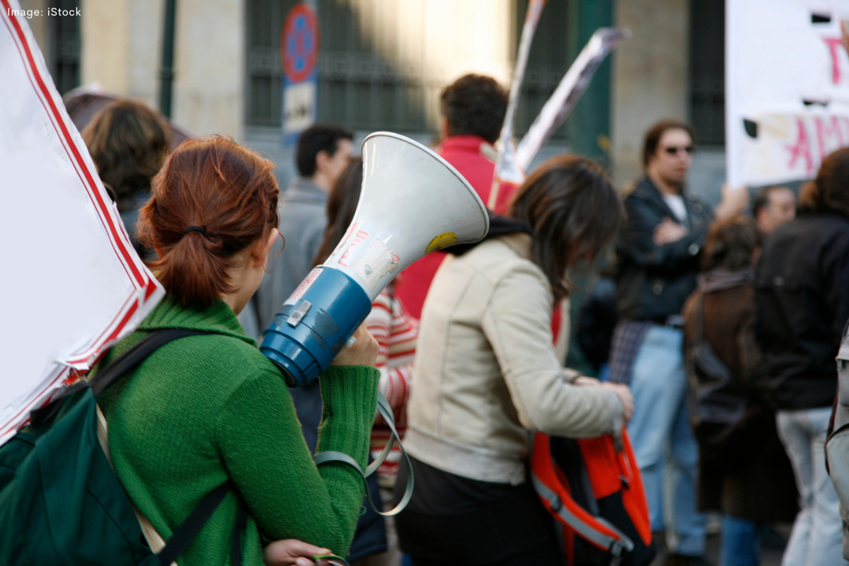Article image for Proposed university merger sparks student protest at Parliament